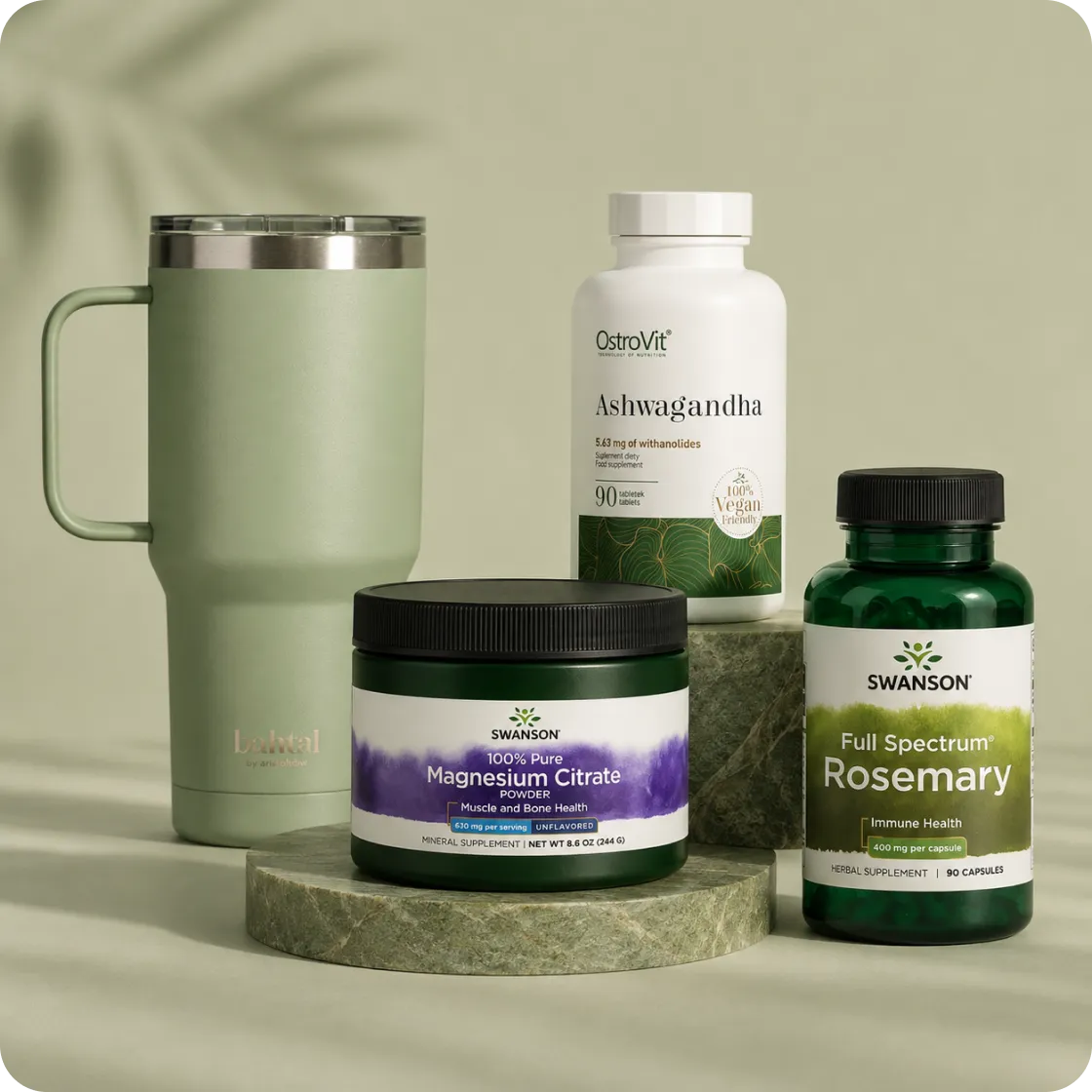Reusable water bottle, magnesium powder and rosemary supplement arranged together